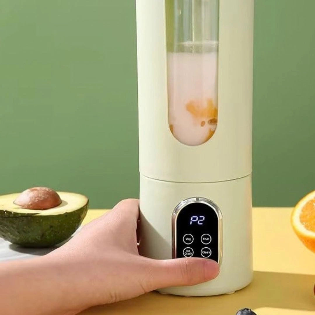 Portable juicer cup being carried outdoors